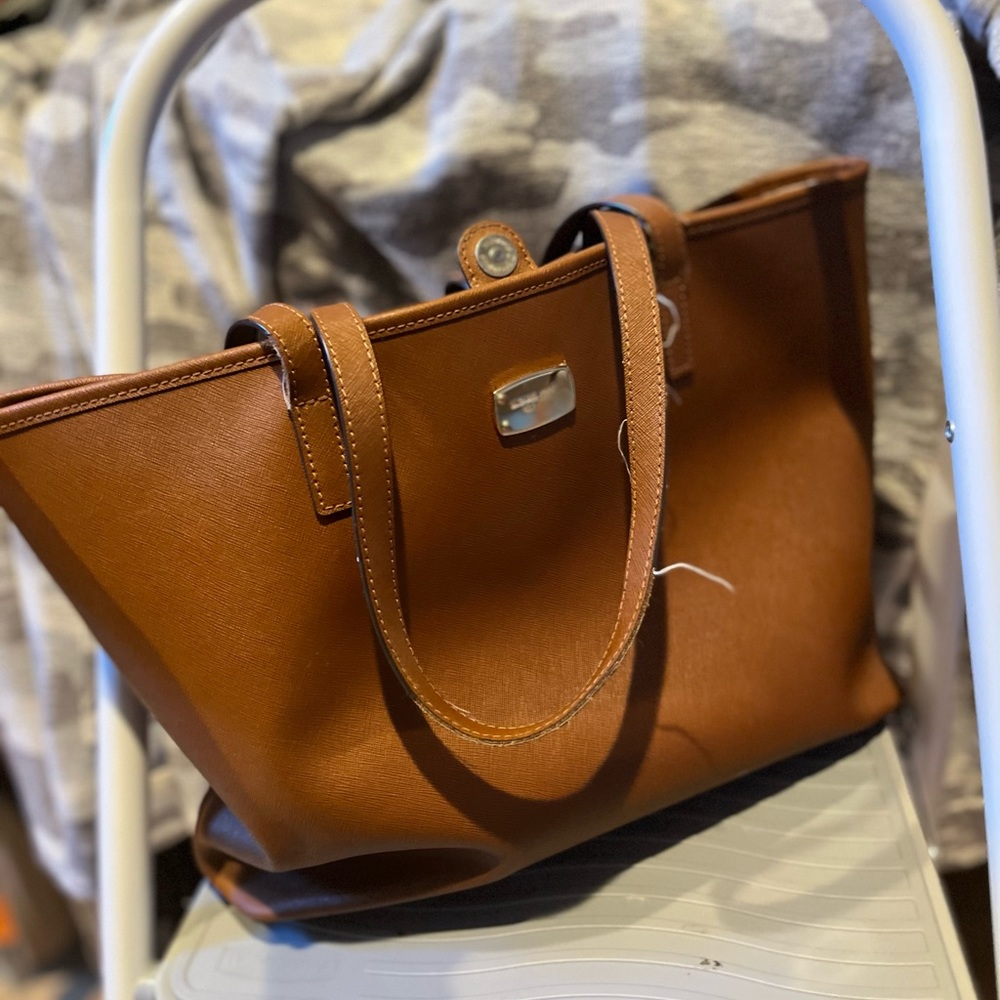 This bag has been used and is worn